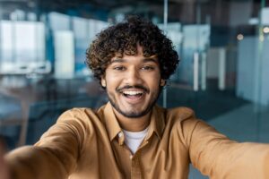 smiling indian office worker looking at camera tal 2024 02 02 00 50 37 utc